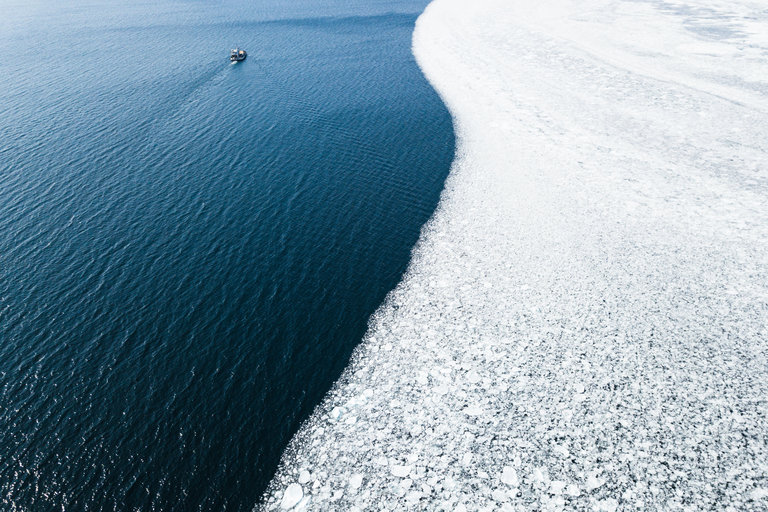 Drone filming the melting of winter ice in Lake Ontario, Canada