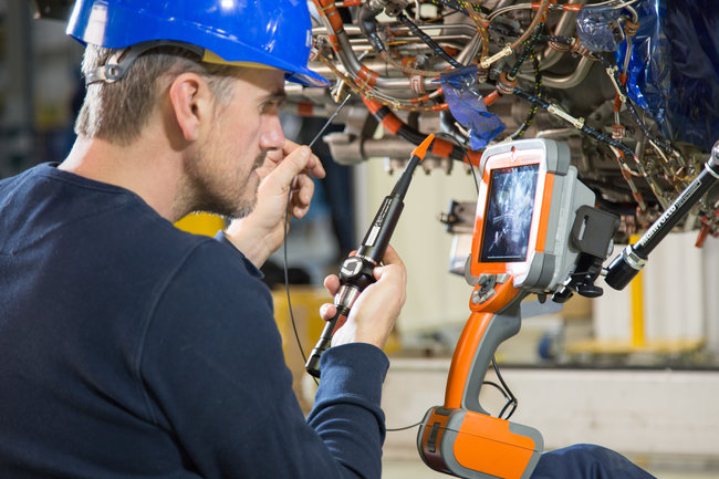 Everest Mentor Visual iQ video probe using point clouds to make a model of aircraft engine during an inspection.